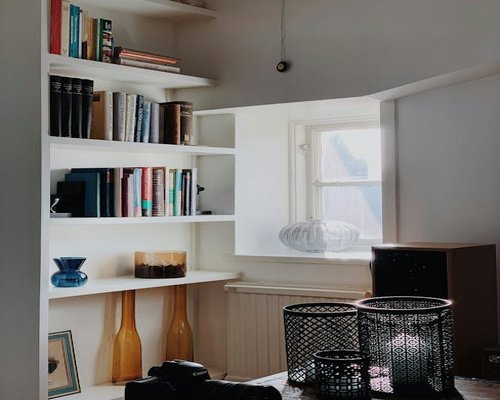 A cozy, well-lit reading corner in a living room